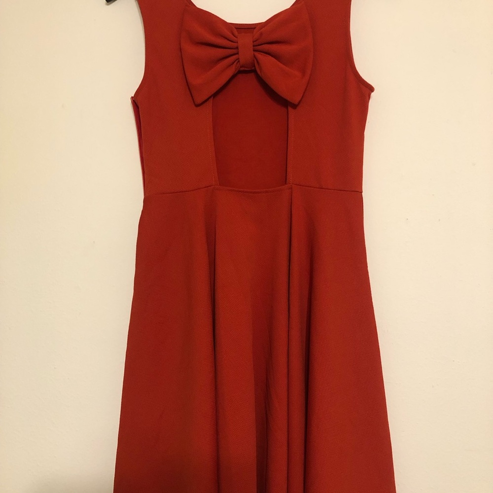 Brick red dress. Back cut out like new condition size S